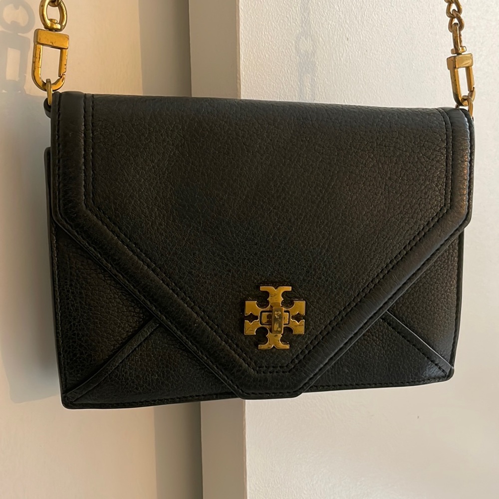 Black leather mini crossbody bag, letter style.